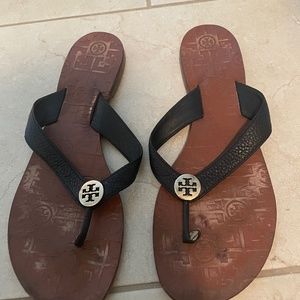 Tory Burch black leather flip flops